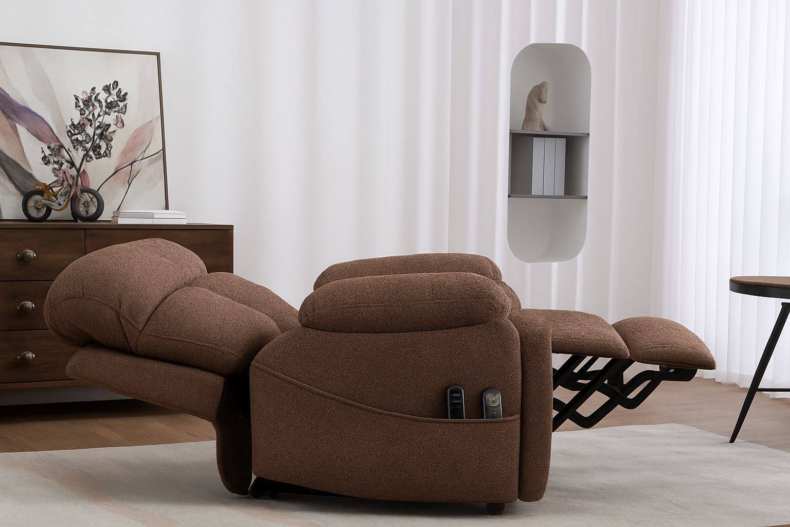 Brown recliner chair in a living room setting with a mirror and artwork on the wall.